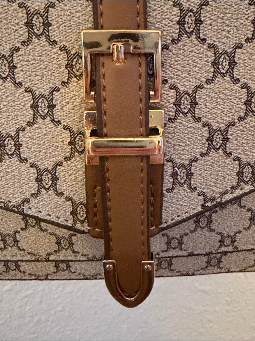 Beige Brown Monogram Shoulder Bag with Gold Buckle with a matching wallet.